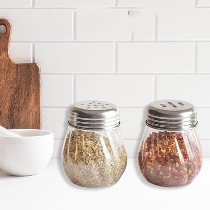 Apex Oregano & Chilli Flakes Dispenser Set – 2 Pcs Plastic Spice Shaker with Stainless Steel Lid Apex Oregano & Chilli Flakes Dispenser Set – 2 Pcs Plastic Spice Shaker with Stainless Steel Lid